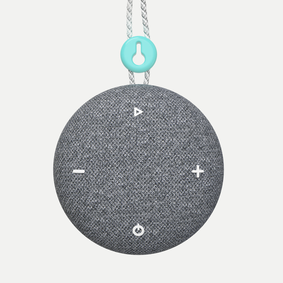 A Tuft and Needle SNOOZ Go 2 Travel White Noise Sound Machine, round gray fabric-covered speaker with white control icons on the front, hanging from a white rope with a turquoise accent ring.