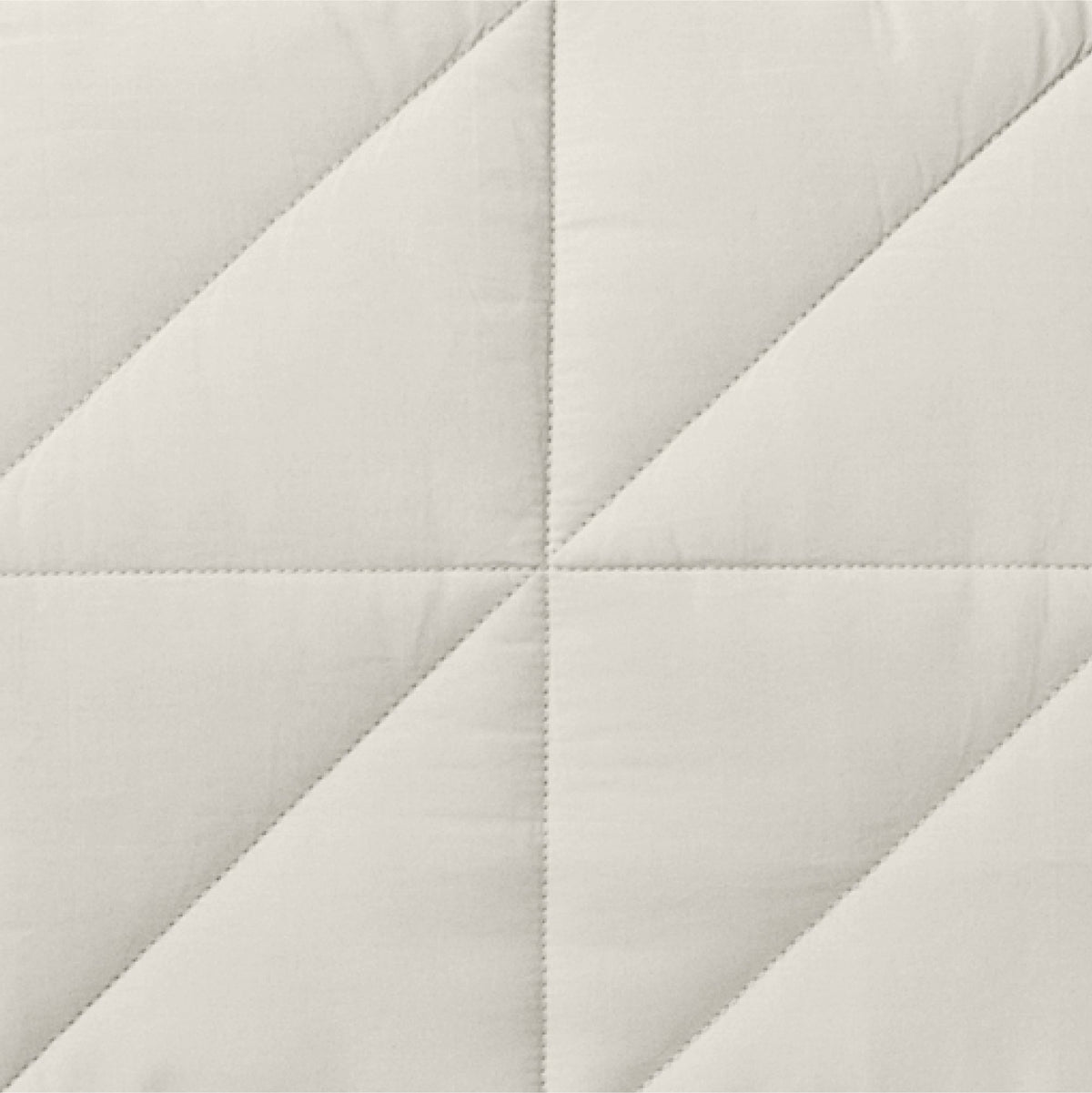 The Tuft and Needle Classic Percale Body Pillow Cover, closeup of the body pillow cover || color: Sand
