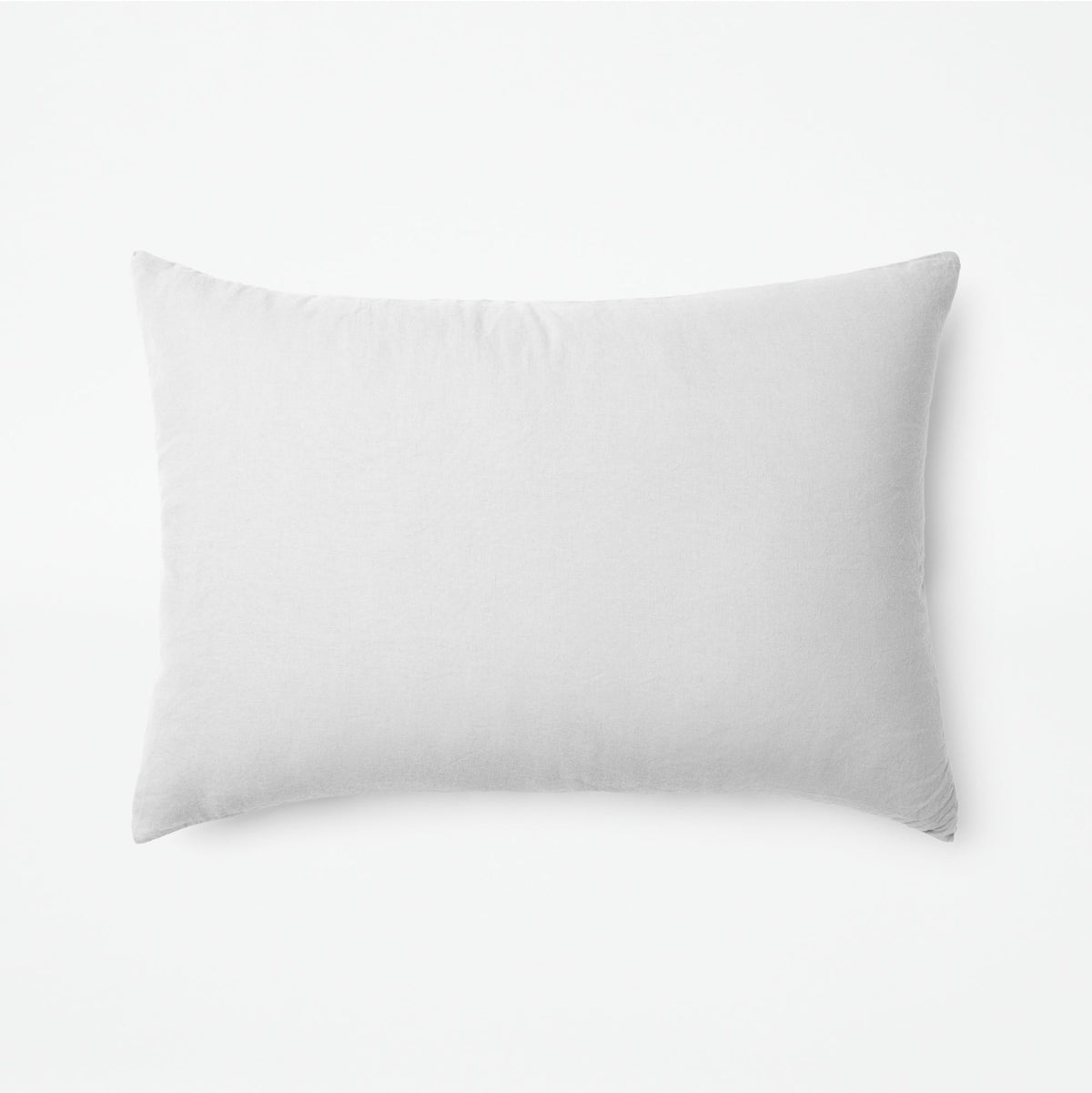 The Tuft and Needle Linen-Cotton Blend Duvet Set, one pillow laying horizontally || color: Cloud
