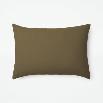 The Tuft and Needle Linen-Cotton Blend Duvet Set, one pillow laying horizontally || color: Martini Olive
