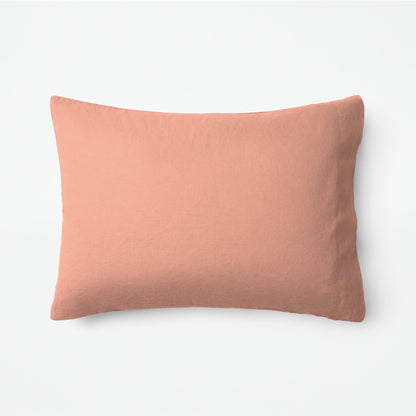 The Tuft and Needle Linen-Cotton Blend Duvet Set, one pillow laying horizontally || color: Muted Clay
