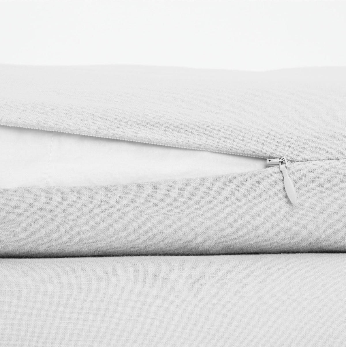 The Tuft and Needle Linen-Cotton Blend Duvet Set, zipper closure on the side of the pillow || color: Cloud
