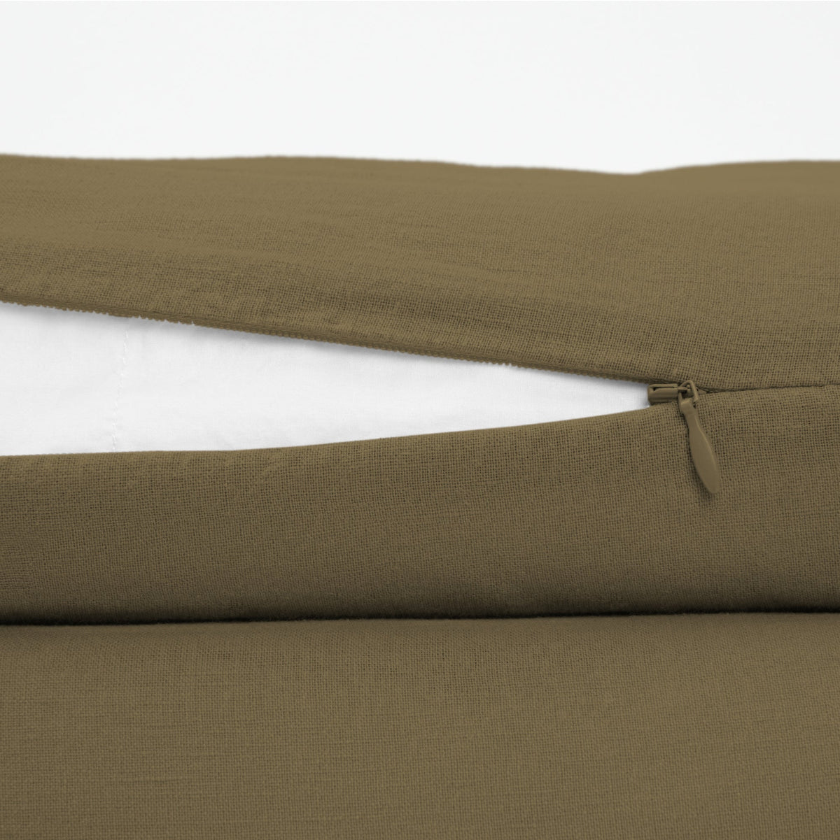 The Tuft and Needle Linen-Cotton Blend Duvet Set, zipper closure on the side of the pillow || color: Martini Olive
