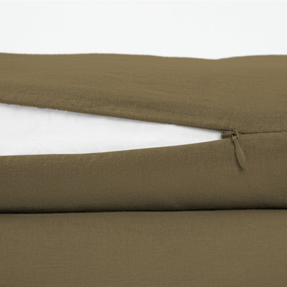 The Tuft and Needle Linen-Cotton Blend Duvet Set, zipper closure on the side of the pillow || color: Martini Olive
