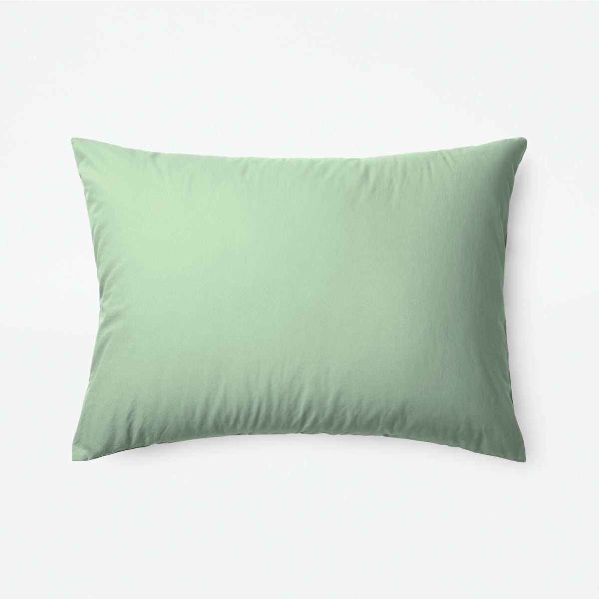 The Tuft and Needle Classic Percale Sheet Set, one pillow laying horizontally || color: Sage
