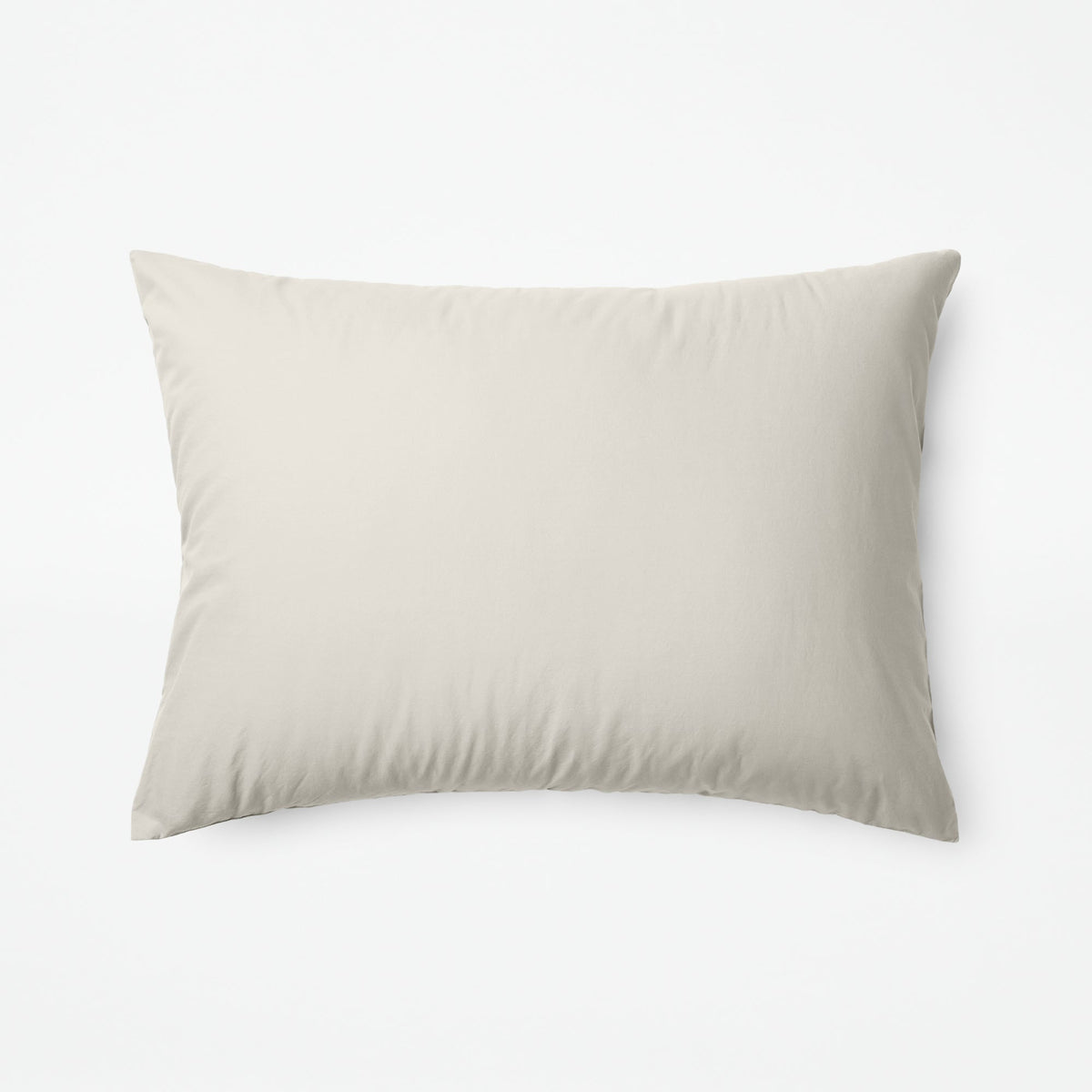 The Tuft and Needle Classic Percale Sheet Set, one pillow laying horizontally || color: Sand
