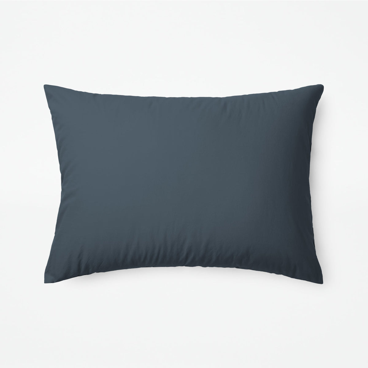 The Tuft and Needle Classic Percale Sheet Set, one pillow laying horizontally || color: Slate
