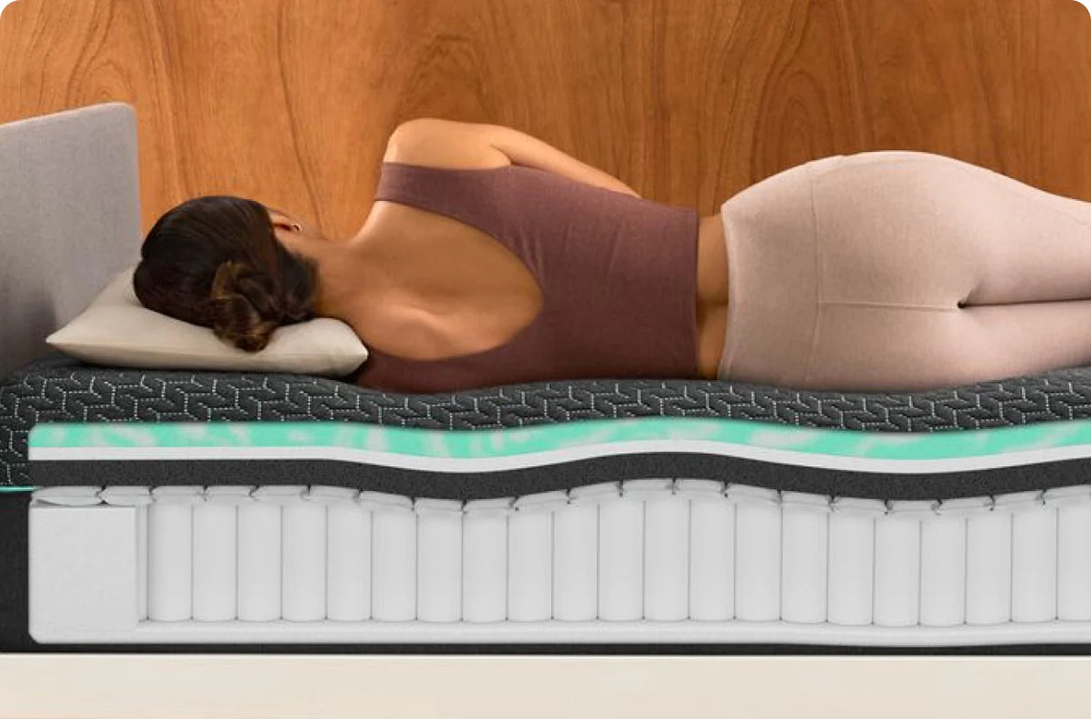 Woman asleep on the hybrid mattress