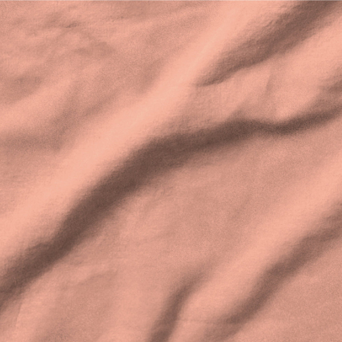 The Tuft and Needle Linen-Cotton Blend Duvet Set, one sheet spread out || color: Muted Clay
