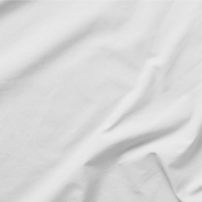 
The Tuft and Needle Classic Percale Sheet Set, one sheet spread out || color: Cloud
