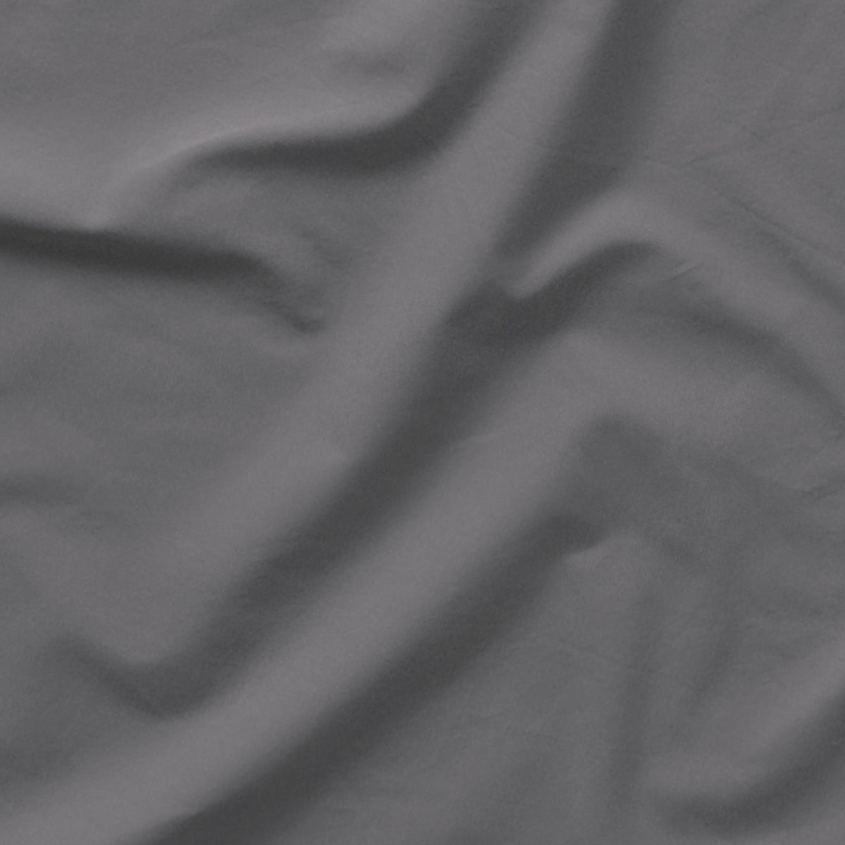 The Tuft and Needle Classic Percale Sheet Set, one sheet spread out || color: Gray Quill
