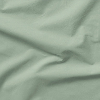The Tuft and Needle Classic Percale Sheet Set, one sheet spread out || color: Sage
