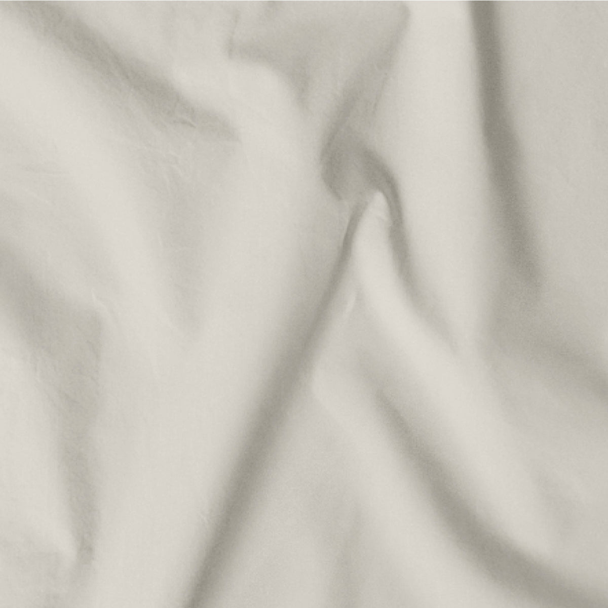 The Tuft and Needle Classic Percale Sheet Set, one sheet spread out || color: Sand
