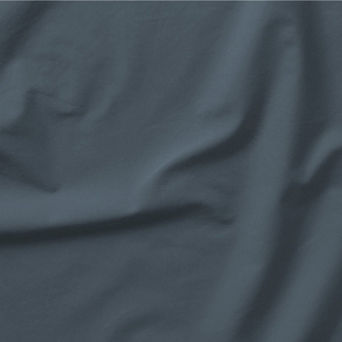 The Tuft and Needle Classic Percale Sheet Set, one sheet spread out || color: Slate
