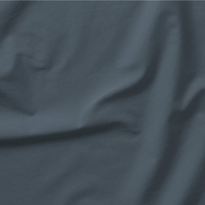 The Tuft and Needle Classic Percale Sheet Set, one sheet spread out || color: Slate
