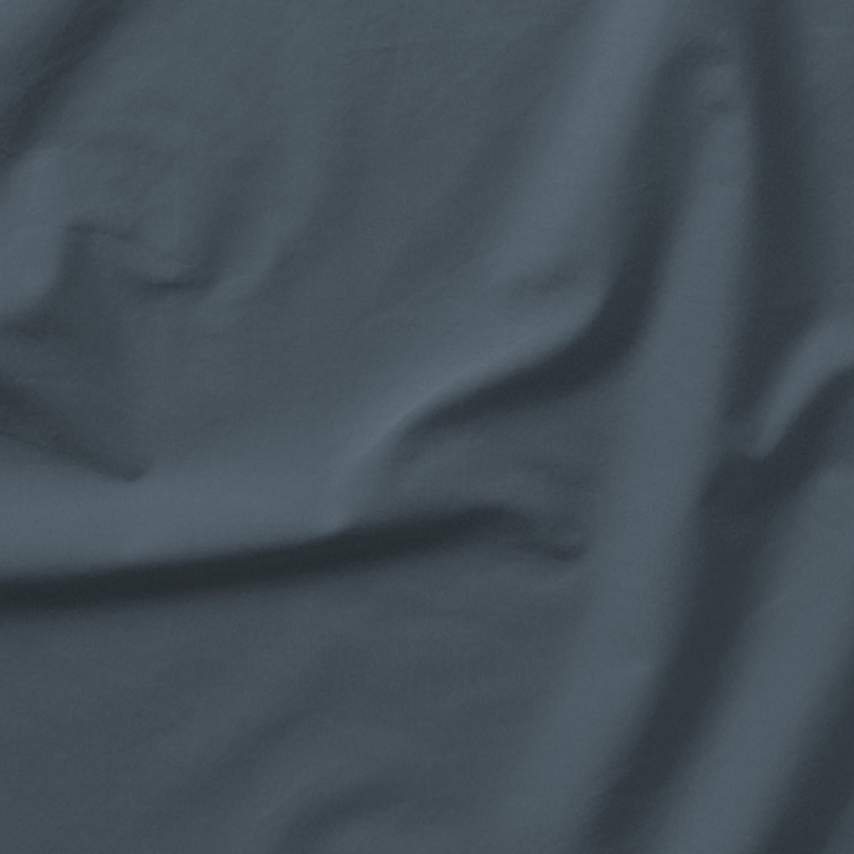 The Tuft and Needle Classic Percale Sheet Set, one sheet spread out || color: Slate
