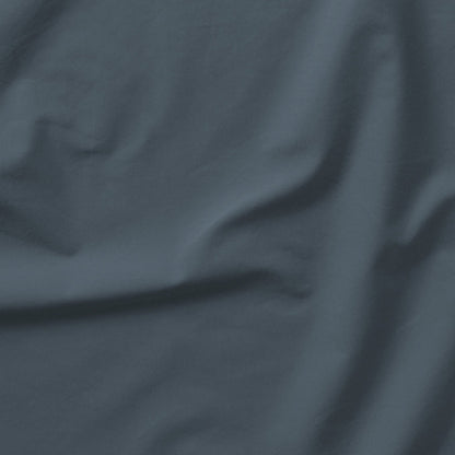The Tuft and Needle Classic Percale Sheet Set, one sheet spread out || color: Slate
