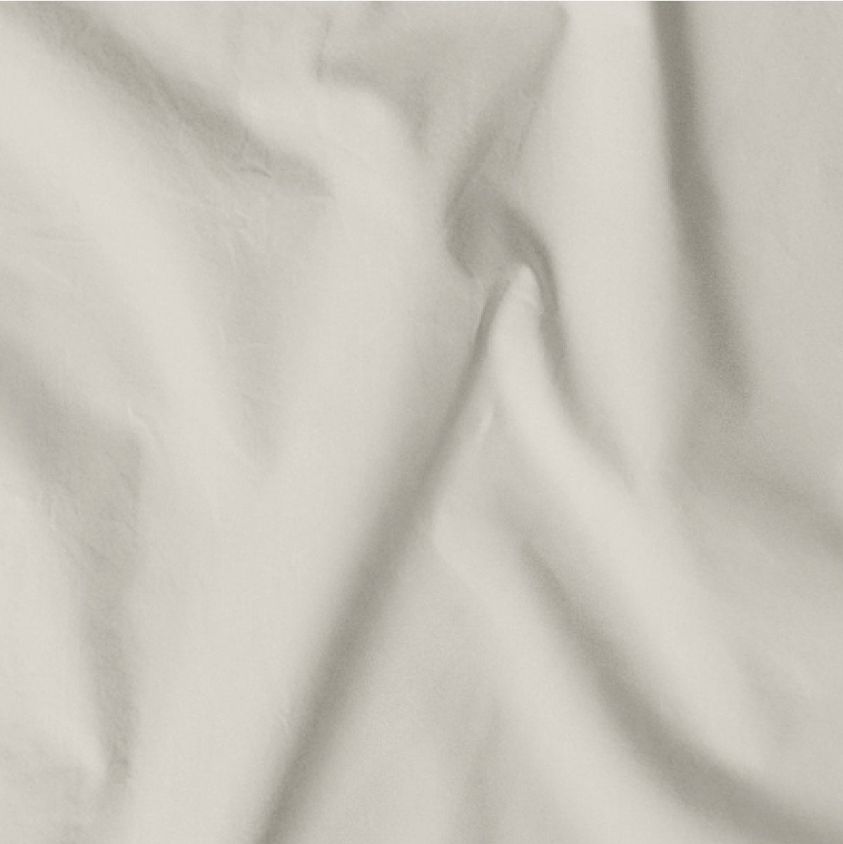 The Tuft and Needle Classic Percale Pillowcase Set, one sheet spread out || color: Sand

