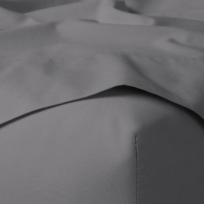 The Tuft and Needle Classic Percale Sheet Set, corner of a mattress with both sheets showing || color: Gray Quill

