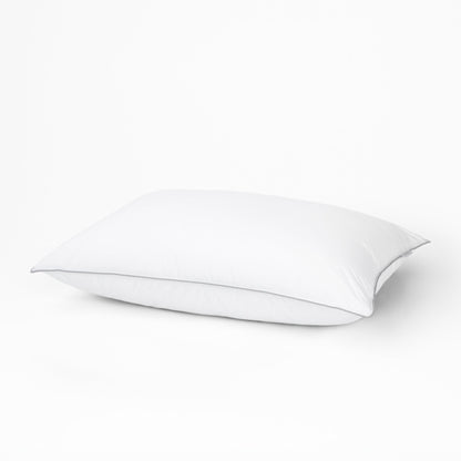 A pillow with the Tuft and Needle Down Alternative Pillow case